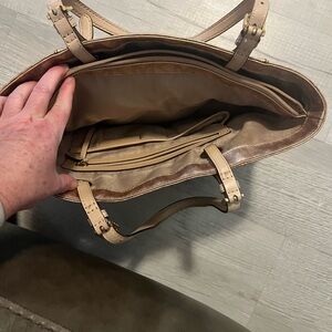 MK woman gold shoulder bag